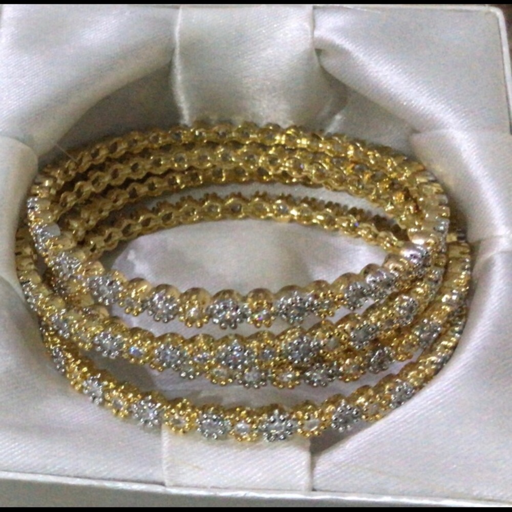 Set of four bangles with stones